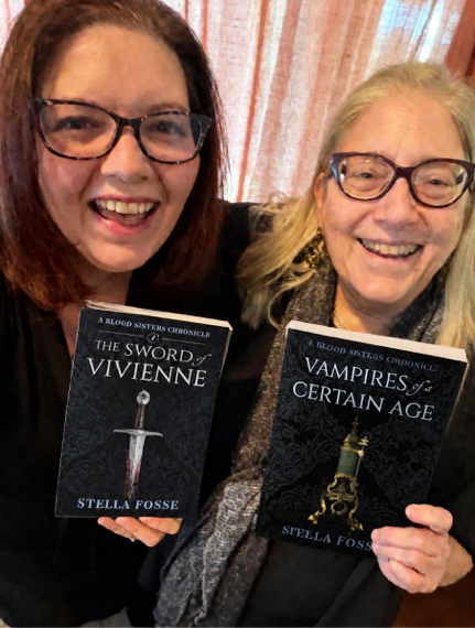 Halloween is for Crones 1 Stella Fosse with her daughter Diana Rosinus, holding both Blood Sisters Chronicles books
